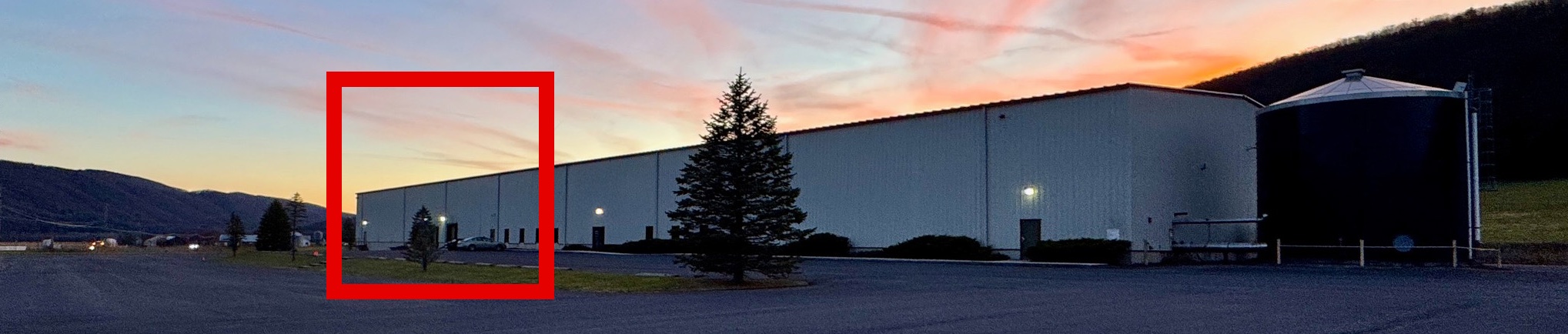 Initiative Distribution warehouse at sunset in Upper Tract, West Virginia